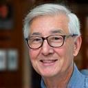 Professional headshot of Dr. David Kim, a calm and reassuring psychologist.