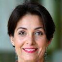 Professional headshot of Dr. Elena Petrova, a nutritionist with kind, intelligent eyes.