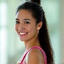 Professional headshot of Sarah Chen, a physiotherapist with an energetic and approachable demeanor.