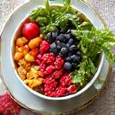 Vibrant, fresh produce and a balanced meal, symbolizing optimal nutrition